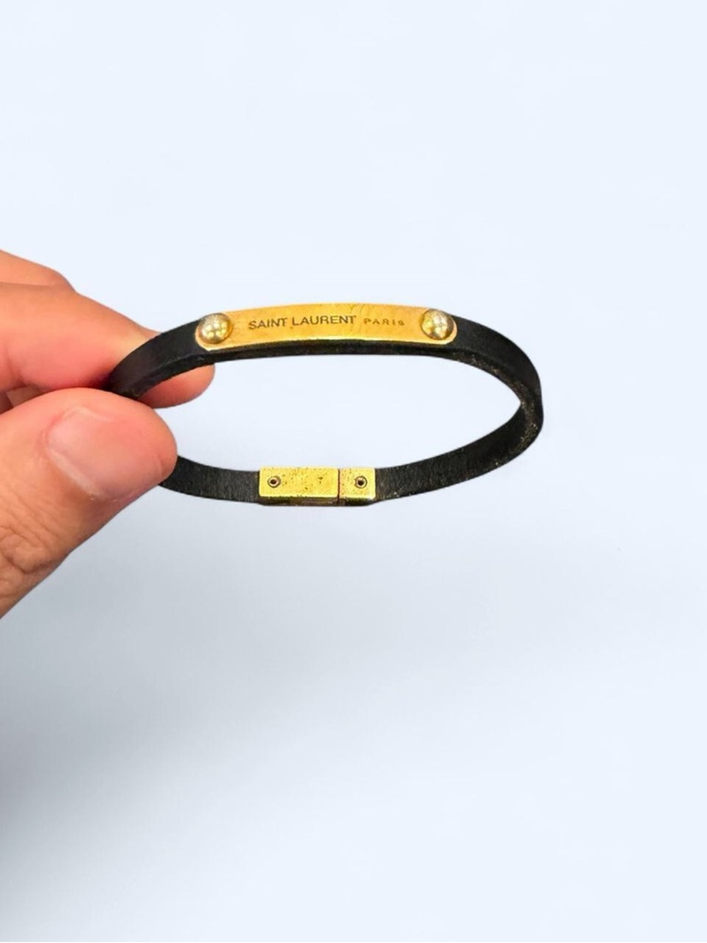 Saint Laurent Black Leather Bracelet with Gold Logo Plate